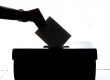 image of someone voting