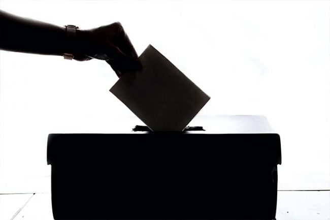 prop-207-blog-image-OFW image of someone voting