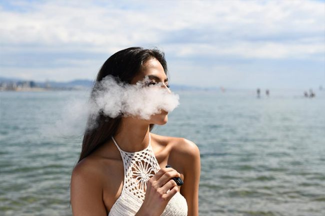 Vaping-and-CBD-Blog-Image-OFW image of woman vaping cbd