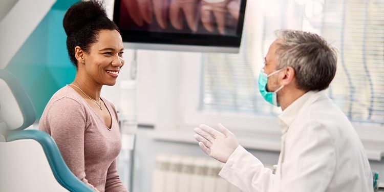 dental-health-blog-img-OFW woman discussing using cbd for oral hygiene and wellness with a dental health professional