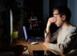 image of man experiencing eye strain from computer, needing CBD for eye health